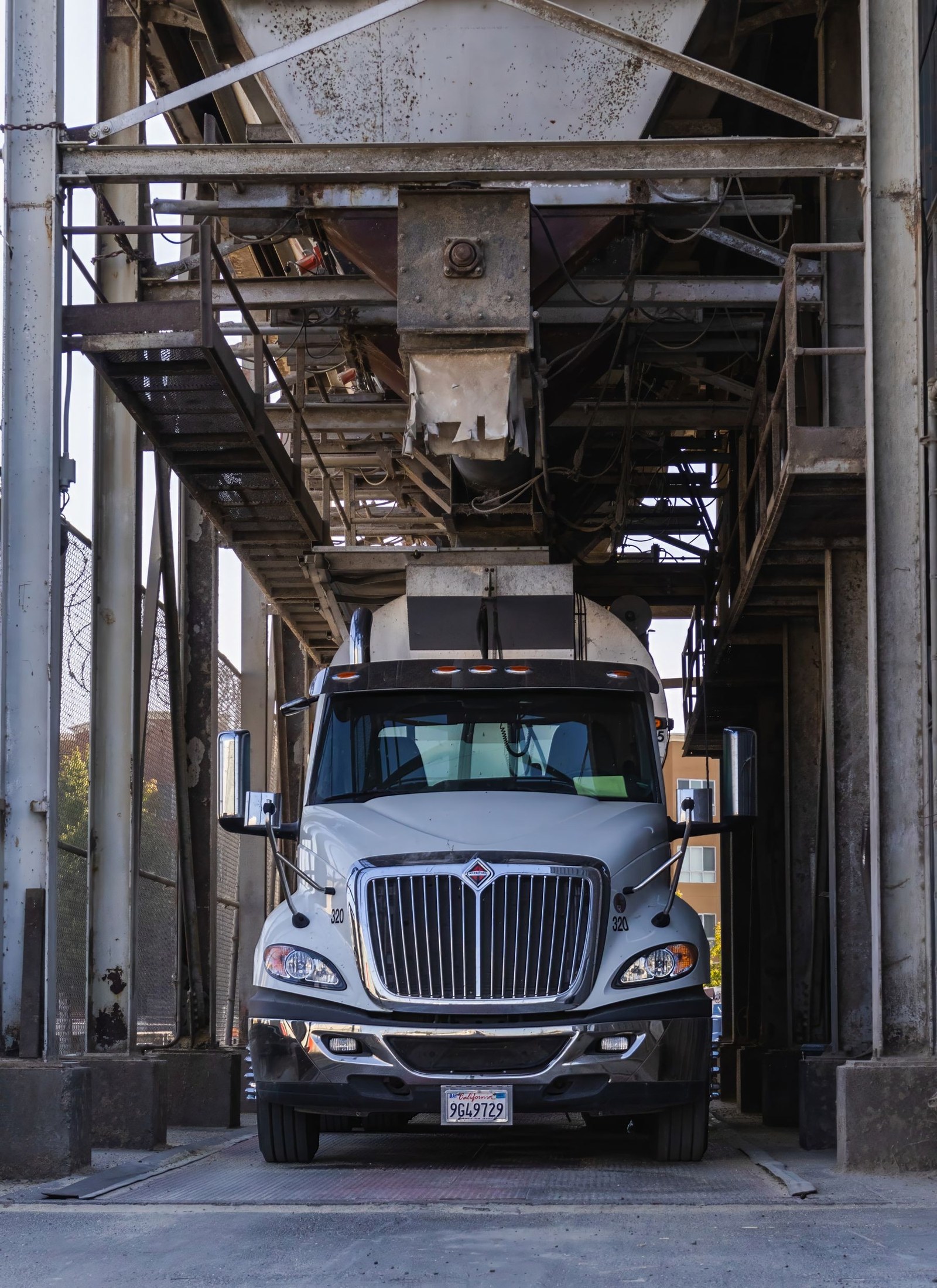 Conventional cargo truck at an industrial loading facility